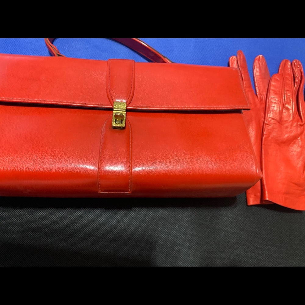 Vintage red handbag and driving gloves